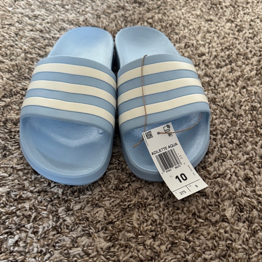 Women Adidas Light Blue and White Adilette Aqua Slides/No original box